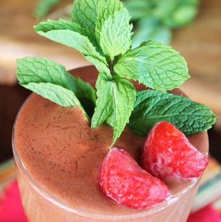 closeup view of mint strawberry chocolate shake