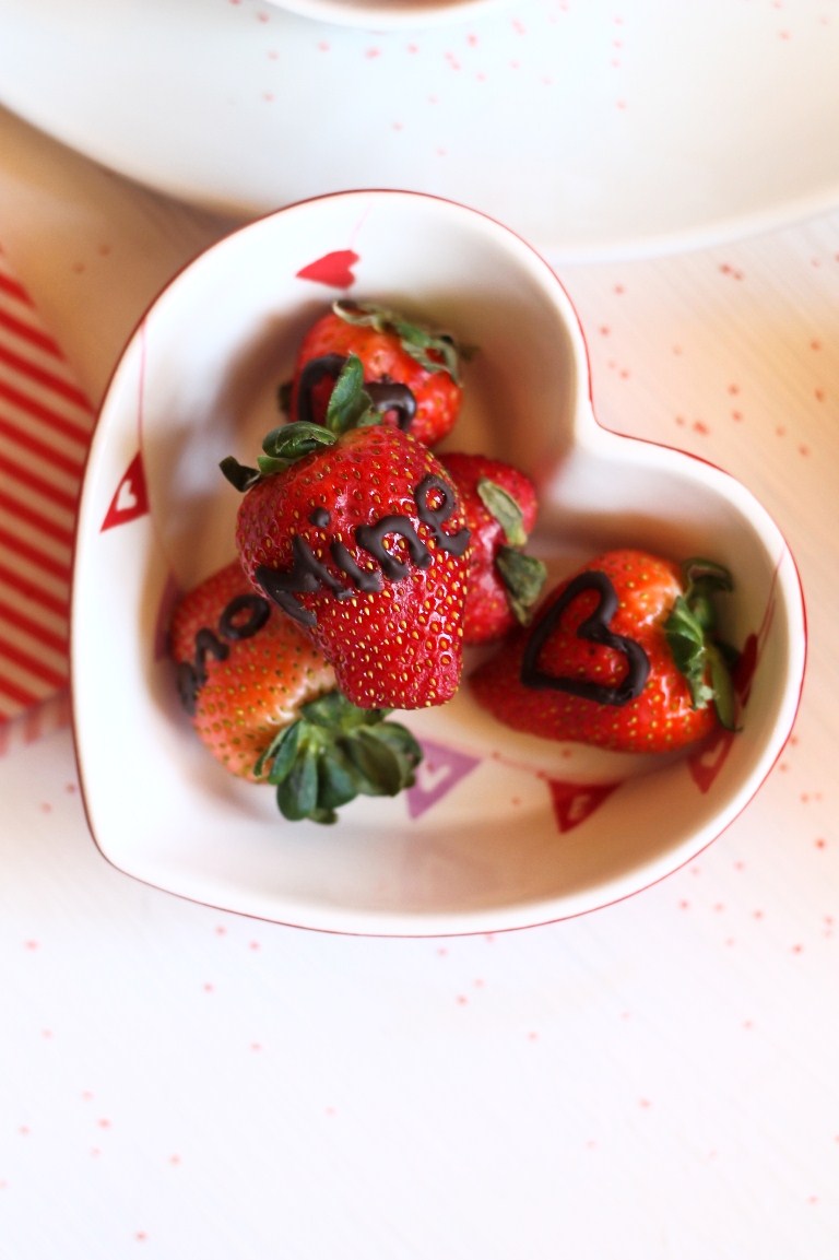healthy valentine's day candy strawberries in heart bowl