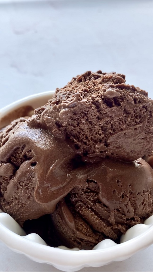3 scoops vegan chocolate ice cream in white bowl
