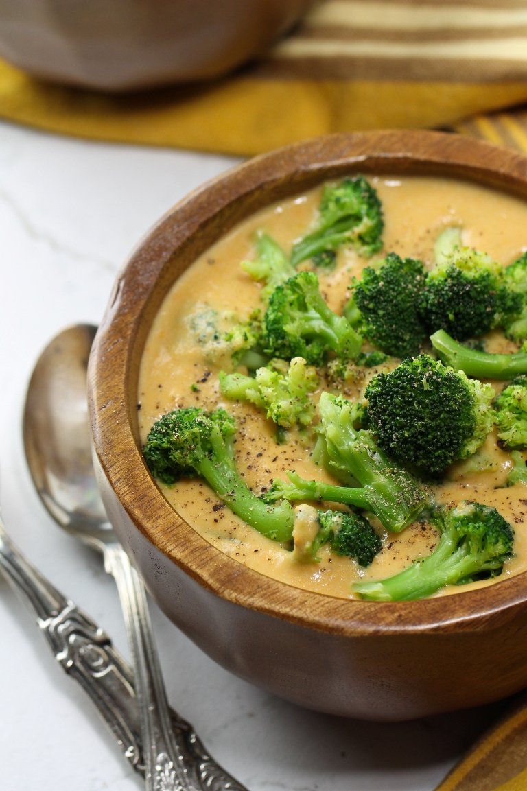 Bowl of vegan sweet potato broccoli cheese soup