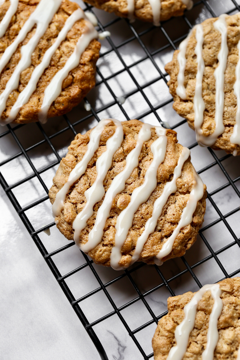 Vegan oatmeal cookies with drizzled glaze on each