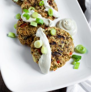 vegan crab cakes with aioli on white platter