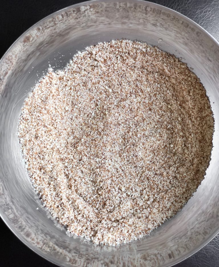 Almond flour in silver bowl