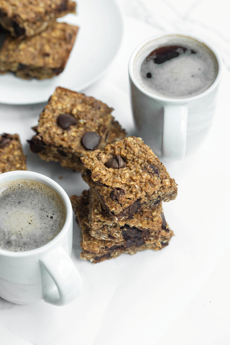 stack of nut-free granola bars next to coffee