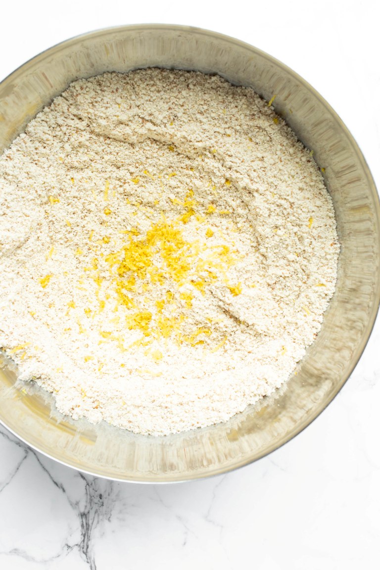 lemon cookies dry ingredients with zest in bowl