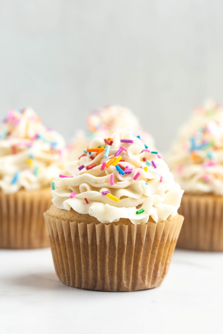 closeup front angle of vanilla cupcake