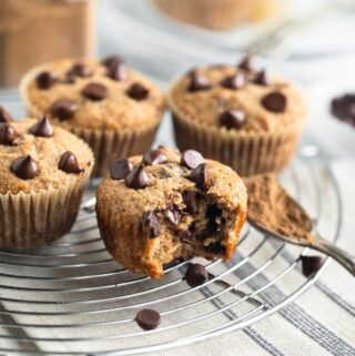 chai muffins on rack with chocolate chips