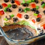 showing inside layers of dip in dish