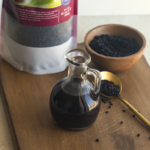 elderberry syrup inside glass jar