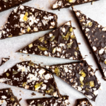 several sliced pieces of ginger coconut chocolate bark