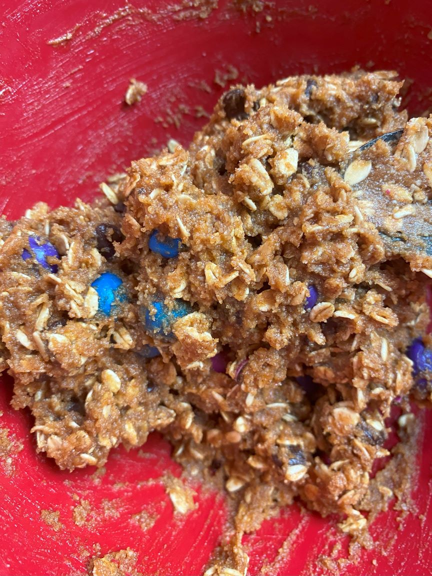 vegan monster cookie dough in red bowl