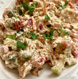 closeup of vegan chicken salad on white platter