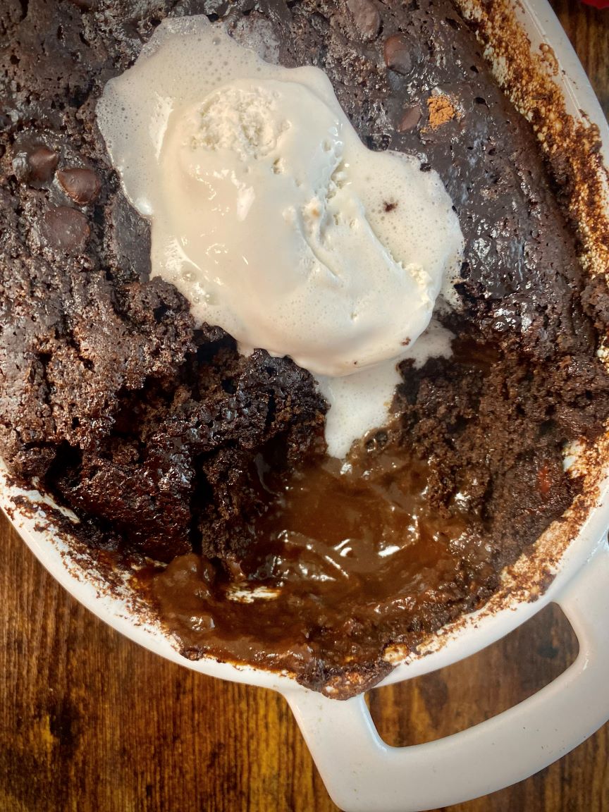 closeup of vegan chocolate pudding cake with saucy bottom