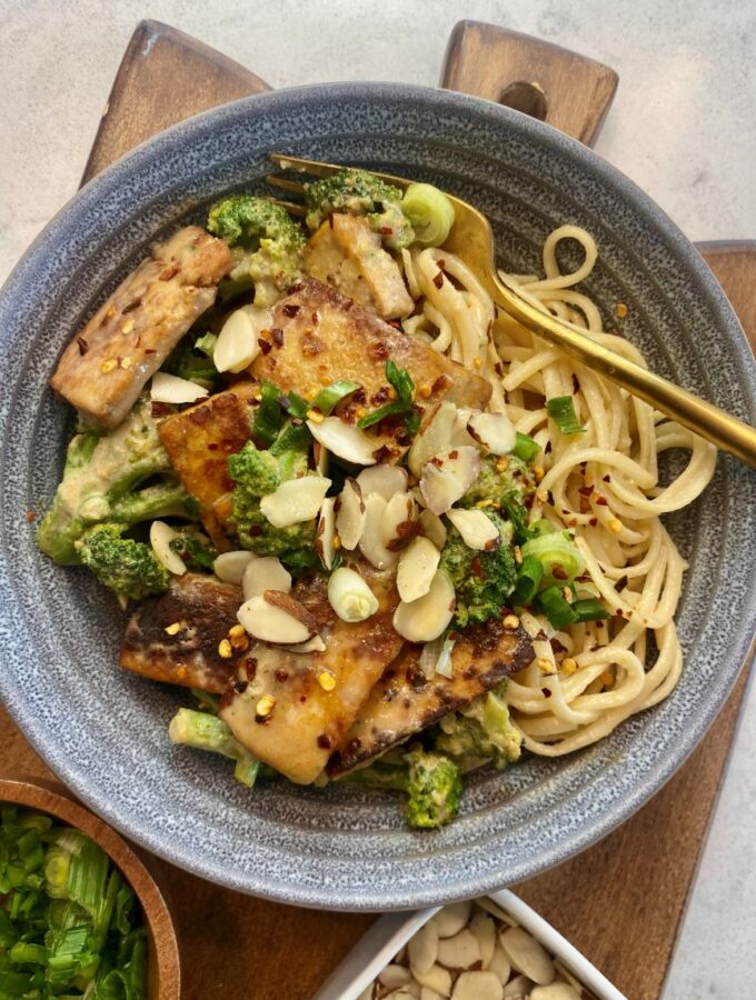 overhead shot of sesame noodles and tofu